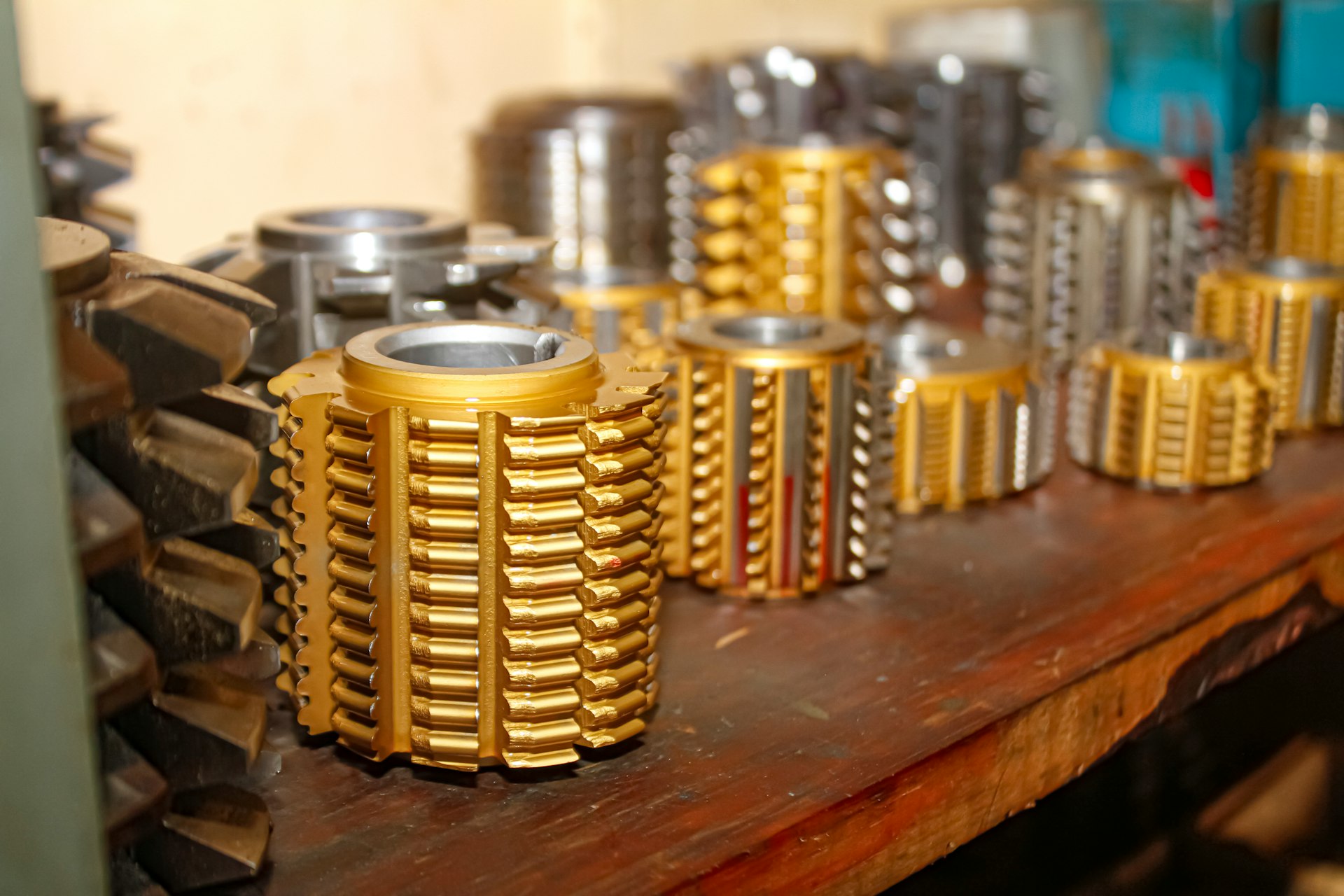 A table topped with lots of gold and silver objects